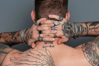 Do you like tattoos? Combine them with rock jewelry made of sterling silver!