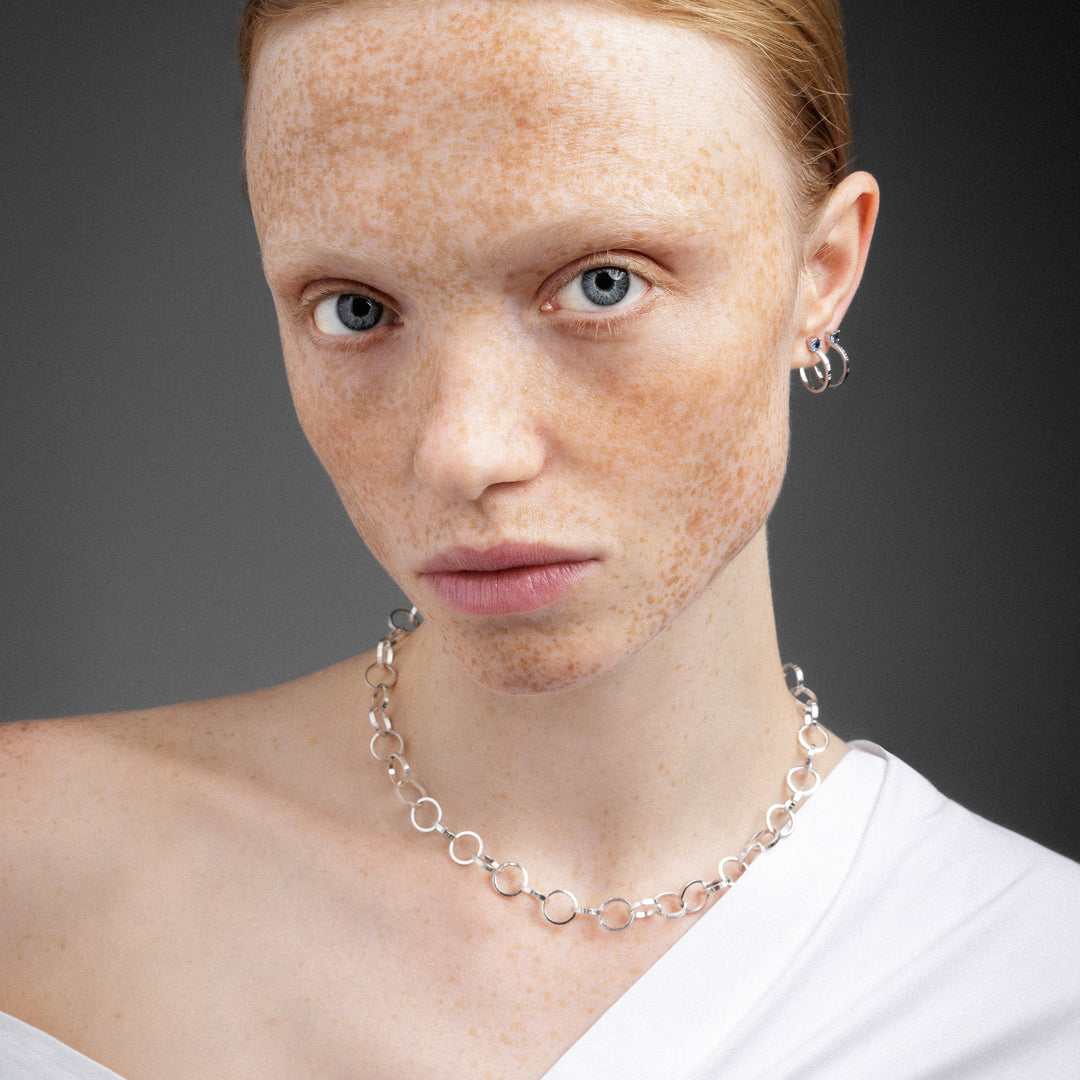 Double hoop earrings with zircons