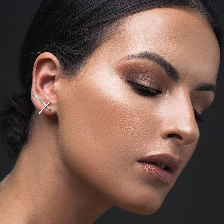 Minimalist sterling silver cross ear climber earrings by Emmanuela®