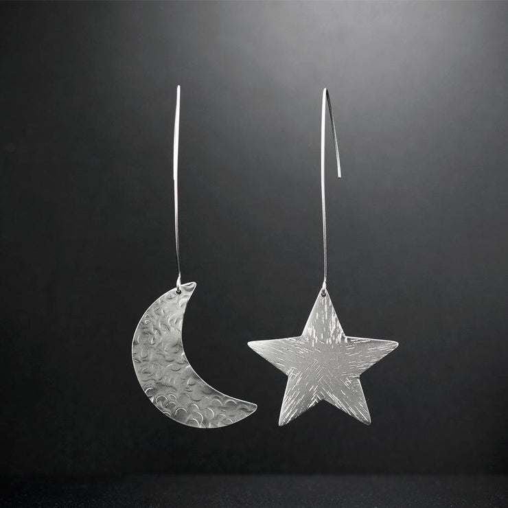 Sterling silver star & moon earrings | Statement jewelry | Emmanuela®