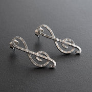 Sterling silver treble clef earring studs, musician gift | Emmanuela®