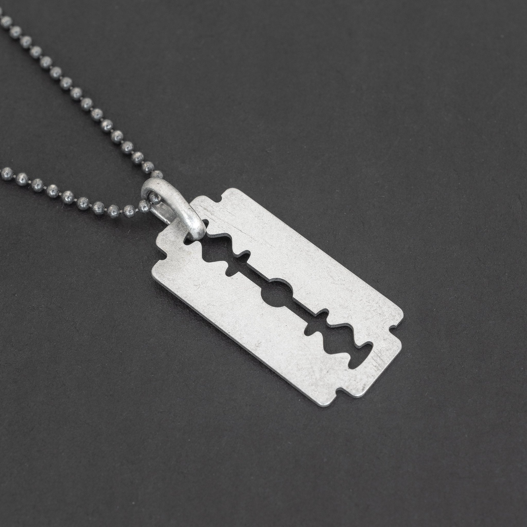 Silver razor blade pendant new arrivals